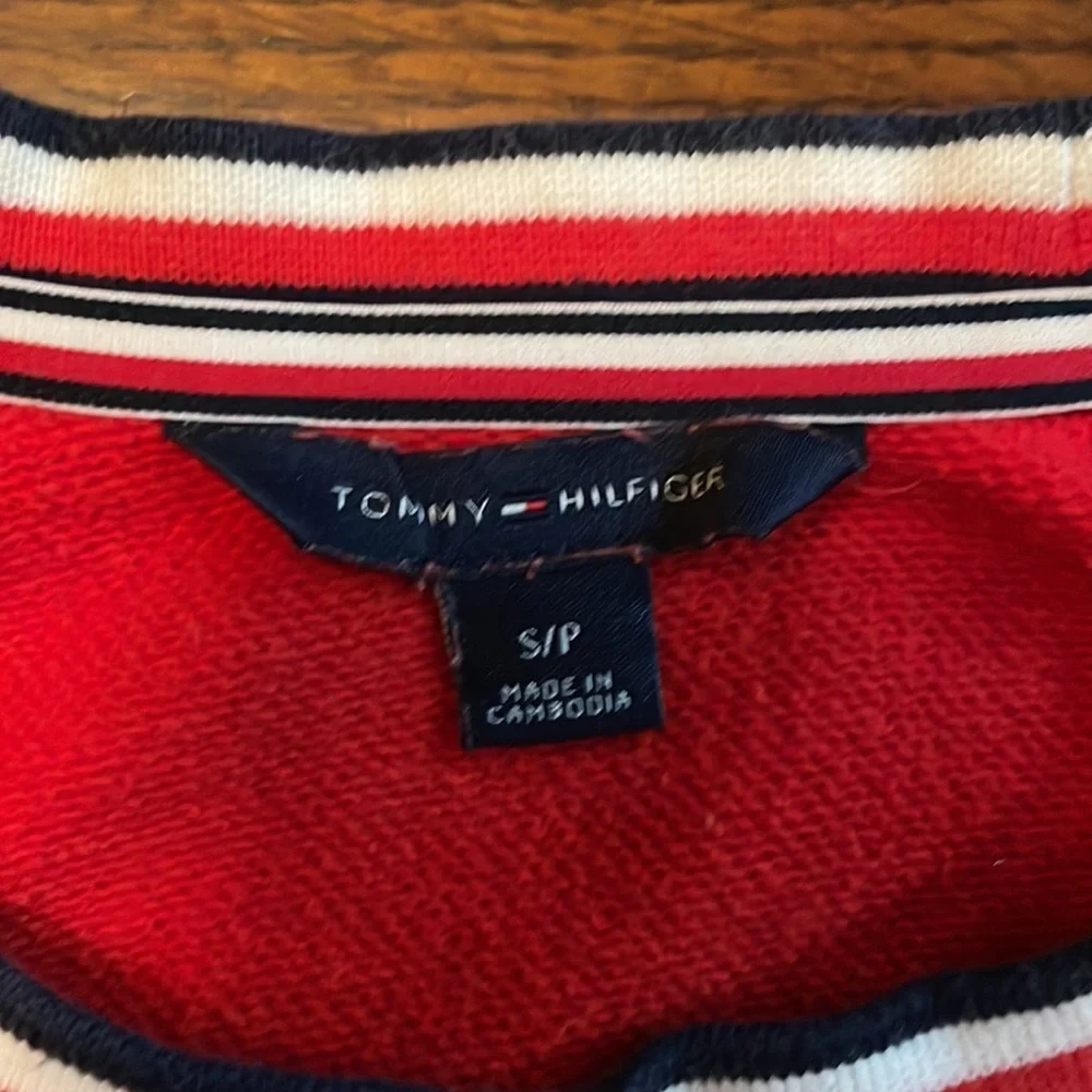 Tommy Hilfiger red sweatshirt top. Small. Spell out across front